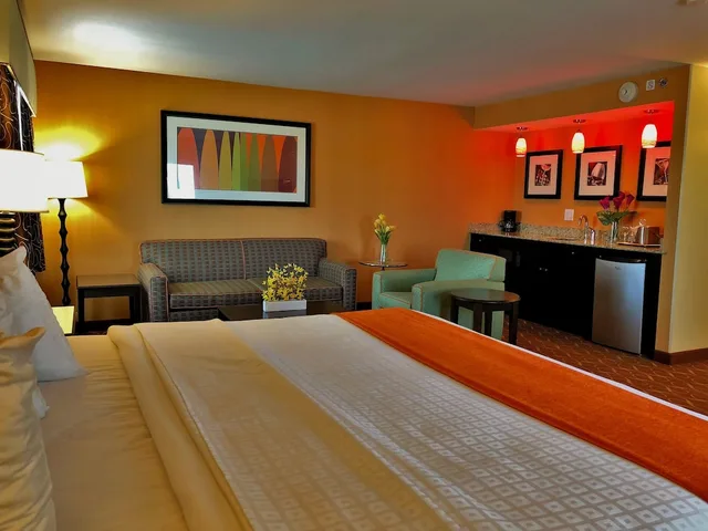 Suite, King Bed, Lux Hotel and Spa, Trademark Collection by Wyndham 1/2