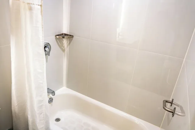 جناح بسريرين مزدوجين بغرفة نوم واحدة مع أريكة، Whitman Motor Lodge 6/7
