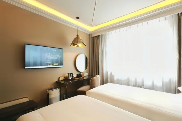 غرفة قياسية بسريرين منفصلين، Jinjiang Metropolo Shanghai Xintiandi Hotel 1/1