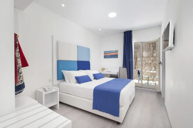 غرفة بسريرين منفصلين في الملحق، Hotel O' Sole Mio 1/7