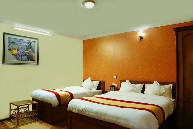 غرفة قياسية بسرير مزدوج وسرير فردي بإطلالة على الحديقة، Kathmandu Garden Home 1/2
