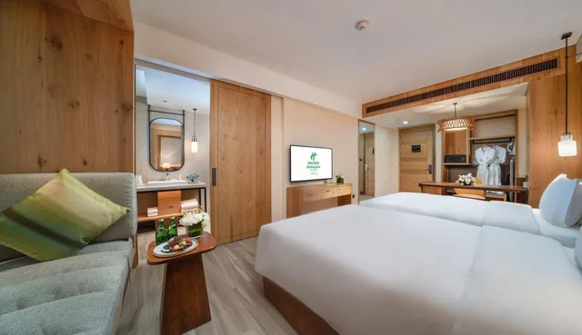 غرفة قياسية بسريرين منفصلين في طابق مرتفع، Holiday Inn Jilin Beidahu 2/3