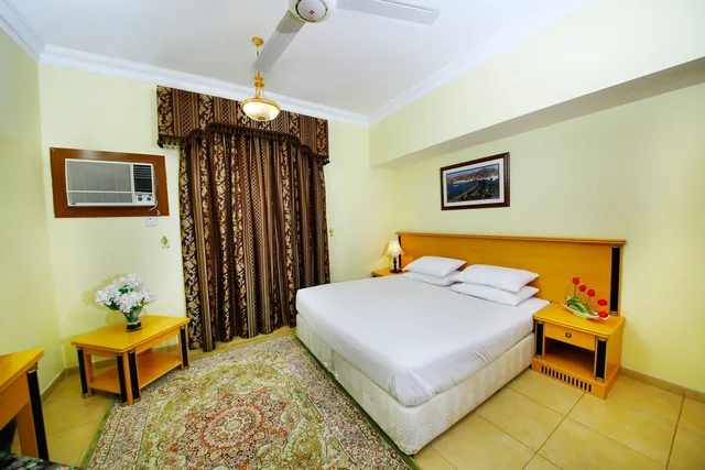 شقة ديلوكس بسرير كينج وسريرين منفصلين بغرفتي نوم، Muscat International Hotel 2/4