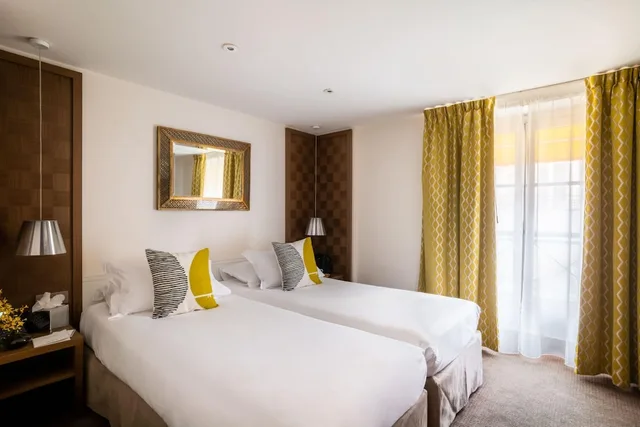 غرفة بسريرين منفصلين، Hotel Le Colisee 2/9