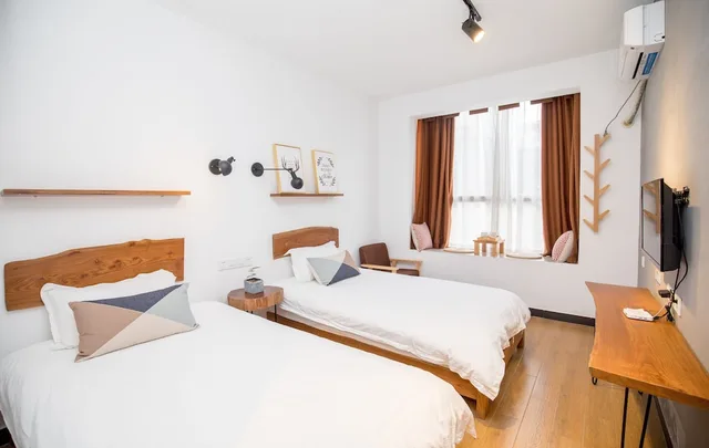 غرفة قياسية بسريرين منفصلين، Zhang Jiajie Zhijue Art Hotel 5/10