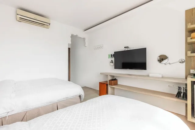 غرفة بسريرين منفصلين بشرفة، Kenting Fairyland & Farm Guest House 9/10