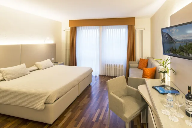 غرفة ثلاثية بسرير كينج وسرير فردي، Hotel Campione 3/4
