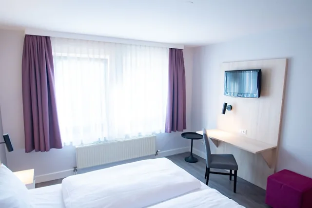 غرفة قياسية مفردة بسرير فردي، Taste Hotel Hockenheim 1/3