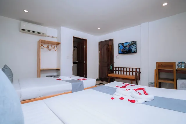 غرفة بسريرين منفصلين بحمام مشترك، Grand Elevation Hotel 6/10