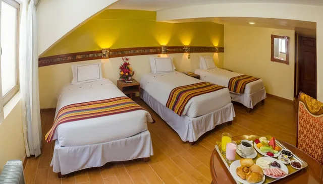 غرفة ثلاثية بثلاثة أسرّة، Taypikala Cusco Hotel 1/4