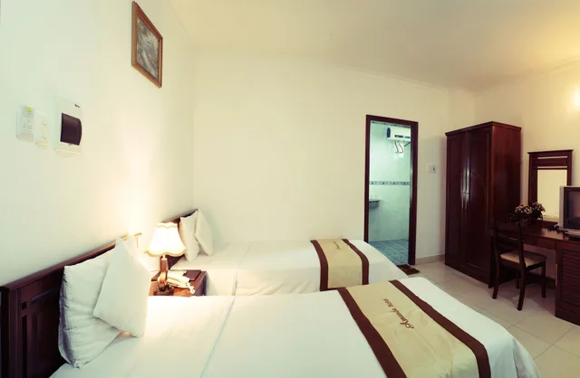 غرفة عائلية ثلاثية بسرير كوين وسرير فردي، Amanda Hotel 1/7