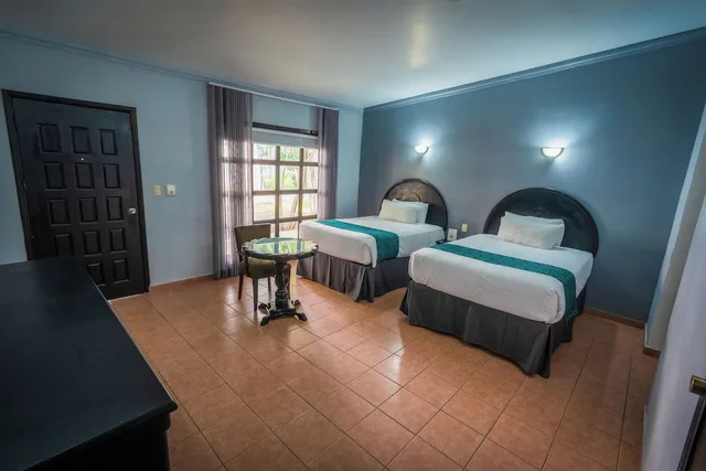 غرفة قياسية بسريرين مزدوجين بإطلالة على الحديقة، InHouse Select Hacienda Tres Rios 4/10