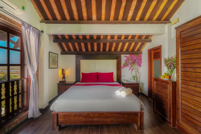 غرفة ديلوكس بسرير مزدوج بإطلالة على النهر، Golden Peach Villa Hoi An 1/7