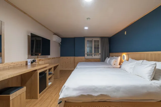 غرفة رباعية بسريرين كوين، New Jeju Hotel 1/9