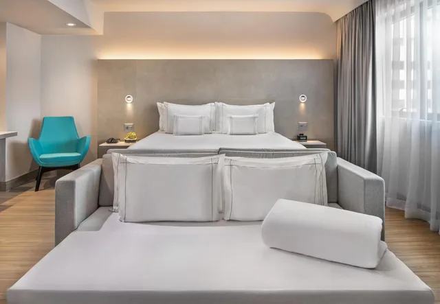 جناح جونيور بسرير مزدوج مع أريكة، Melia Ibirapuera 4/10