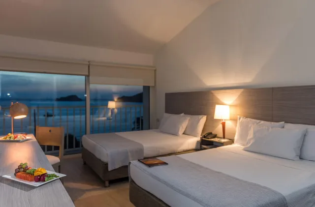 deluxe, Hotel Tamaca Beach Resort 1/3