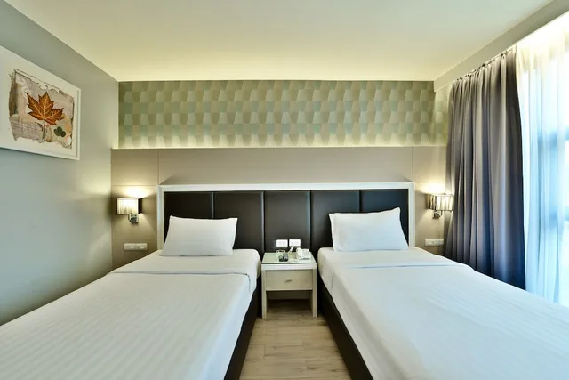 غرفة ديلوكس بسريرين منفصلين، Prestige Suites 1/3