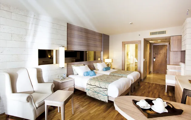 غرفة قياسية بسريرين منفصلين بإطلالة على الحديقة، Melas Resort Hotel Side 4/5