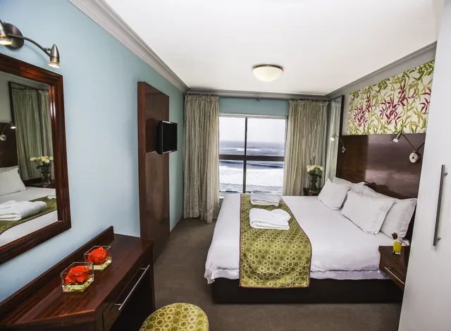 شقة بسرير كينج وسريرين منفصلين بإطلالة على البحر بغرفتي نوم، The Palace Resort And Spa 1/5