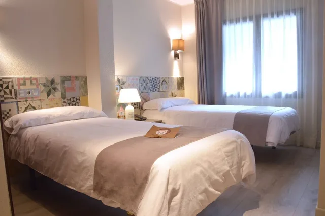 غرفة رباعية بأربعة أسرّة، Hotel Tudel 3/5