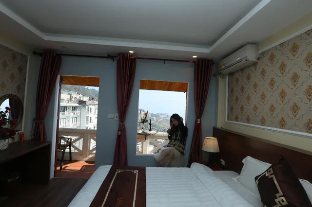 غرفة متصلة ديلوكس عائلية بسريرين منفصلين بشرفة، Sapa Unique Hotel 2/2