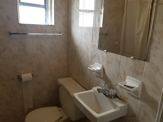 غرفة مفردة بسرير مزدوج، sunny south motel 4/5