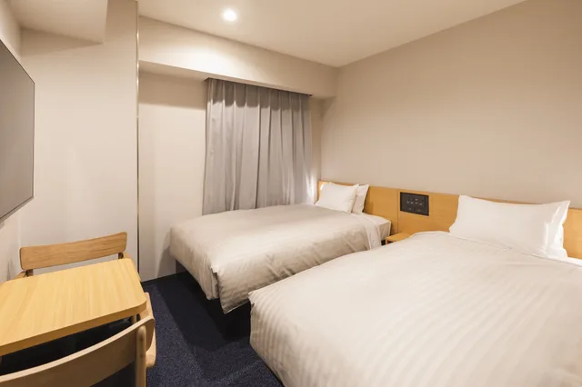 غرفة سوبيريور بسريرين منفصلين، Sotetsu Fresa Inn Daimon 1/3