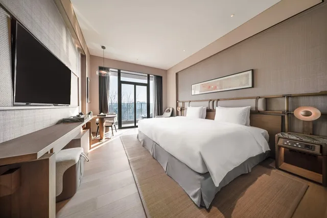 غرفة ديلوكس بسرير كينج بإطلالة على الحديقة، Ocean Spring Resort Chengdu - MGallery Collection 1/3