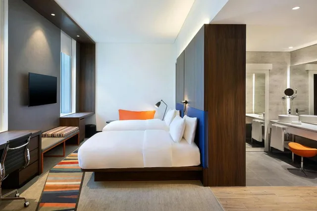 Savvy, Guest Room, Twin Beds، Aloft Dubai Airport 3/5