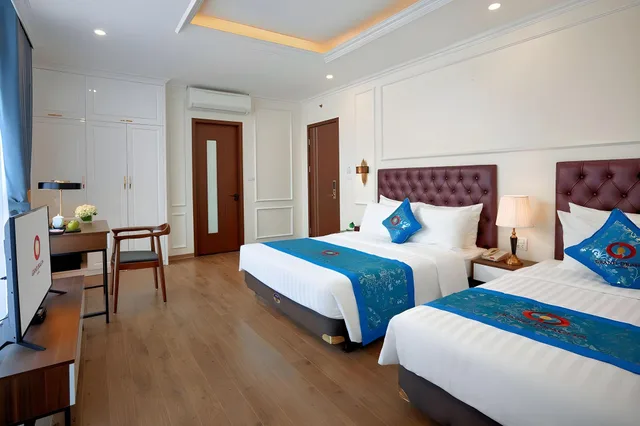 غرفة عائلية بإطلالة على المدينة، Grand Dragon Hotel Hanoi 1/2