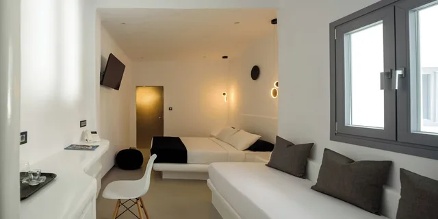 غرفة ديلوكس ثلاثية بسرير مزدوج مع أريكة، Tataki Hotel 5/10