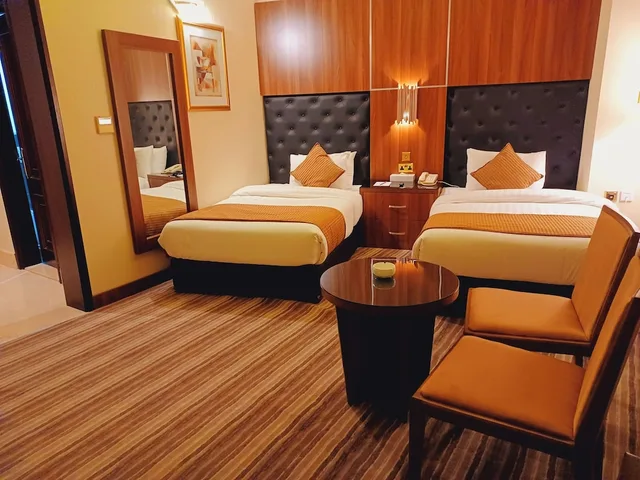 غرفة ديلوكس بسريرين كوين، Royal Qatar Hotel 1/3