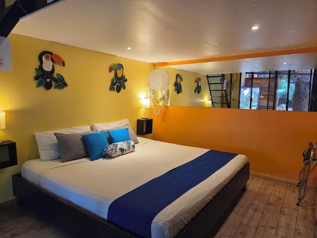 غرفة رباعية بسرير كينج وسريرين منفصلين بإطلالة على الحديقة، Hotel La Palapa 1/7