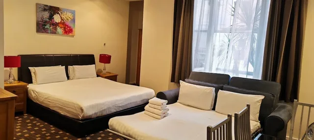 استوديو رباعي بسرير مزدوج مع أريكة، Grand Plaza Serviced Apartments 10/10