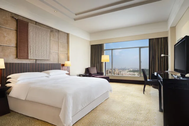 غرفة ديلوكس بسرير كينج بغرفة نوم واحدة، Sheraton Dongguan Hotel 1/4