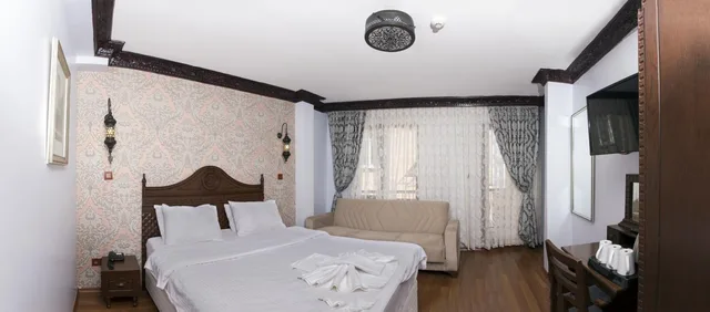 غرفة ديلوكس ثلاثية بإطلالة جزئية على البحر، Mytra Hotel 3/10