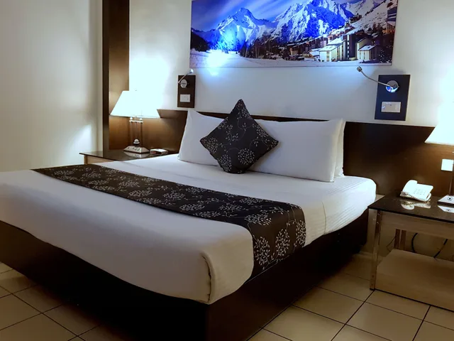 غرفة بريميوم بسرير كوين، Executive Hotel Manila 1/7