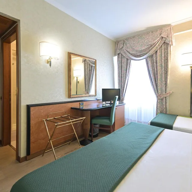 غرفة ثلاثية، Hotel Principe 7/9