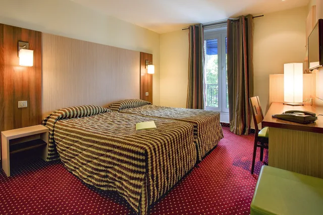 غرفة تنفيذية بسريرين منفصلين، HOTEL TERMINUS MONTPARNASSE 7/10