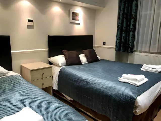 Semi Basement, Triple, 1 Double and 1 Single Bed, Small، Rhodes Hotel 2/2