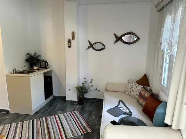 غرفة غراند رباعية بسرير كوين وسريرين منفصلين، Kefi Beach And Suites 8/10
