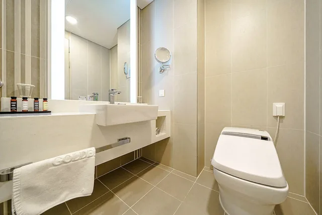 غرفة قياسية بسرير كينج، Golden Tulip Incheon Airport Hotel and Suites 3/4