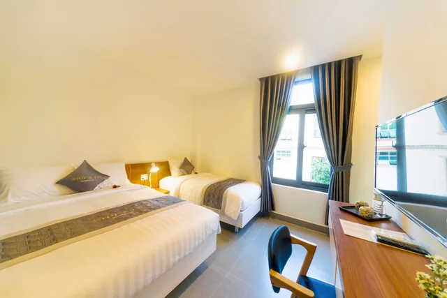 Mega, Triple, 1 Queen and 1 Single Bed، Stop And Go Boutique Homestay In Hue 2/7