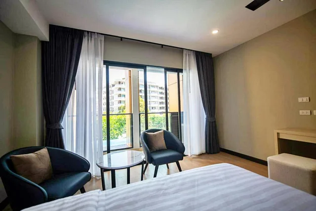 غرفة بريميوم بإطلالة على المسبح بحوض استحمام، Lewit Hotel Pattaya, a member of Radisson Individuals 3/5