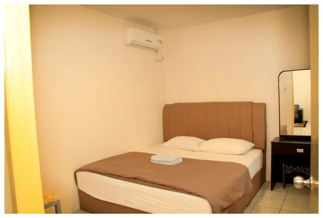 غرفة قياسية بسرير كوين وسرير فردي بغرفتي نوم، Apartment Queen Victoria Batam 1/2