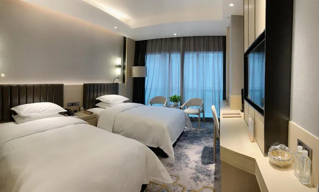 غرفة ديلوكس بسريرين منفصلين بإطلالة على المدينة للمدخنين، Grand Metropark Hotel Liyuan Chongqing 3/6