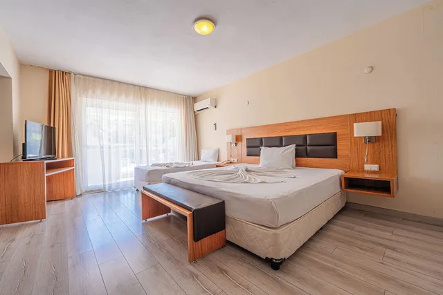جناح بثلاثة أسرّة بغرفة نوم واحدة مع أريكة، Begonville Hotel 4/10