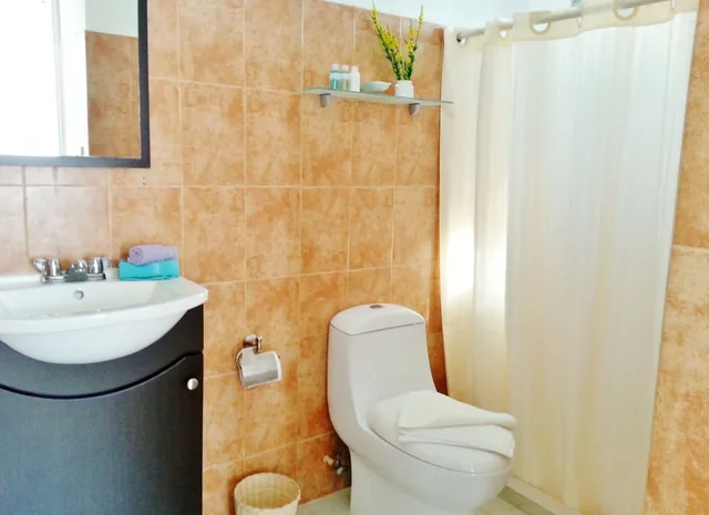 2 Bedrooms, Family Suite, 1 King and 2 Double Beds, Garden Area، Corales Suites 2/2