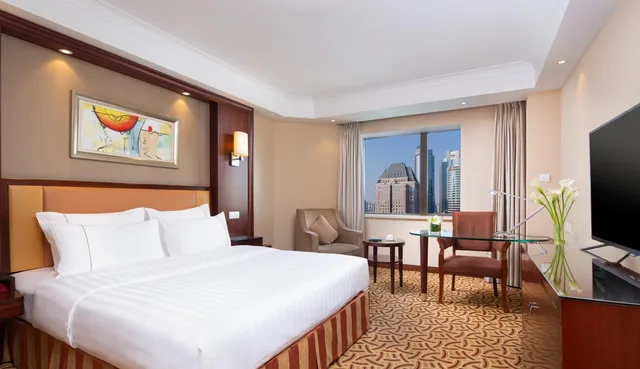 غرفة ديلوكس تنفيذية بسرير كوين، Jianguo Hotel Shanghai 1/1