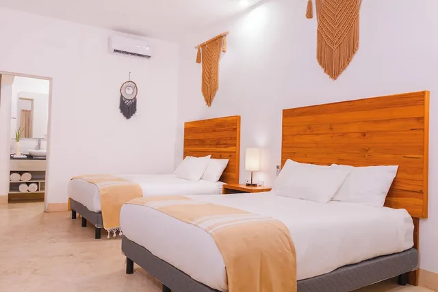 غرفة ديلوكس بسريرين كوين بإطلالة على المسبح، Collection O Kaab Downtown Tulum 3/9